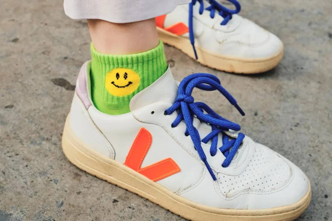 Some young people are declaring a preference for crew socks, which generally rise to midway up the shin.