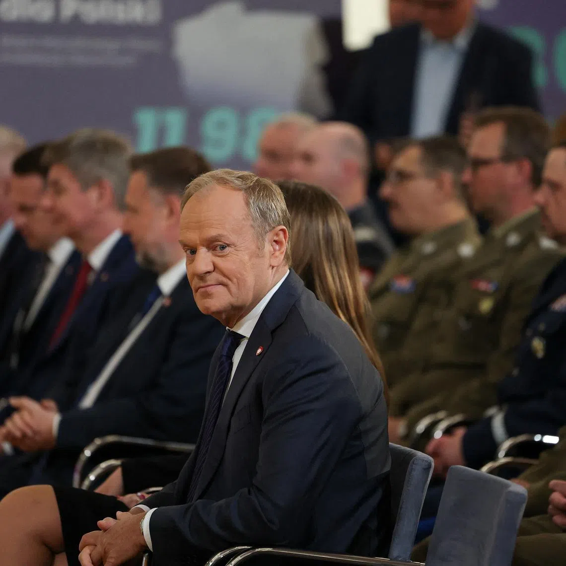 Polish Prime Minister Donald Tusk attends a signing ceremony for Poland's SAFE programme loan agreement, making it the first EU member state to sign the agreement, in Warsaw, Poland, May 8, 2026. REUTERS/Kacper Pempel