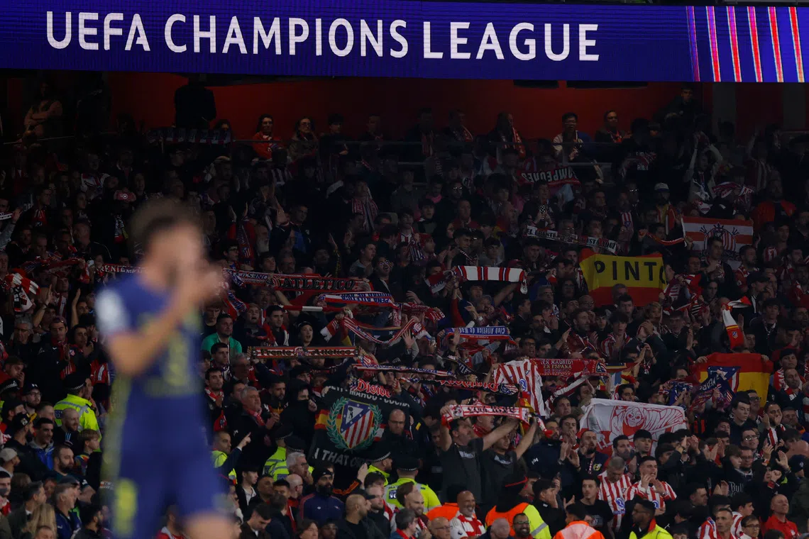 Soccer Football - UEFA Champions League - Arsenal v Atletico Madrid - Emirates Stadium, London, Britain - October 21, 2025 Atletico Madrid fans hold up scarves Action Images via Reuters/Andrew Couldridge
