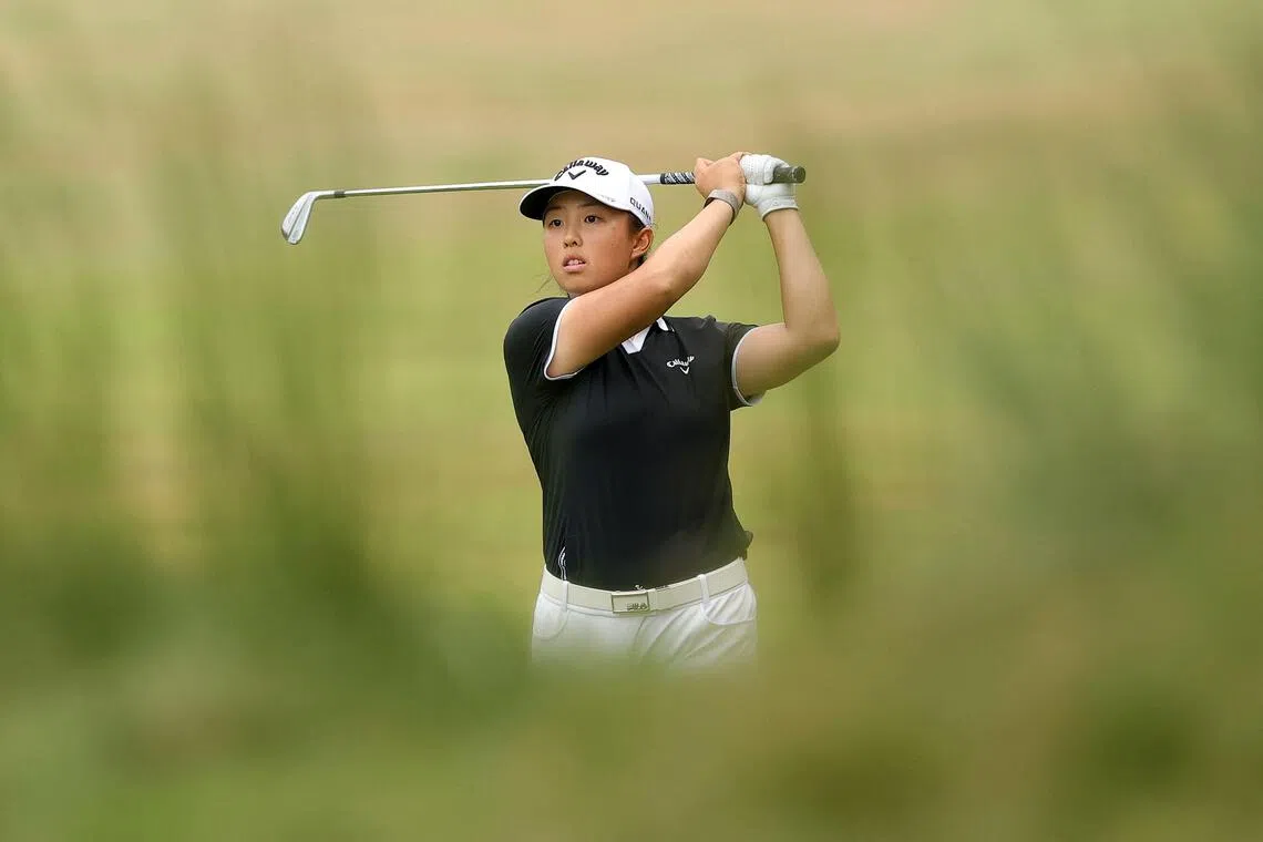 Eventual champion Yin Ruoning of China plays a shot on the 18th hole during the final round of the FM Championship at TPC Boston on Aug 30.