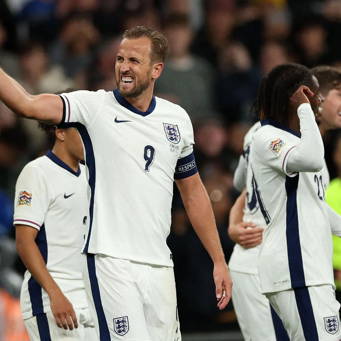 England striker Harry Kane celebrates scoring the team's second goal.