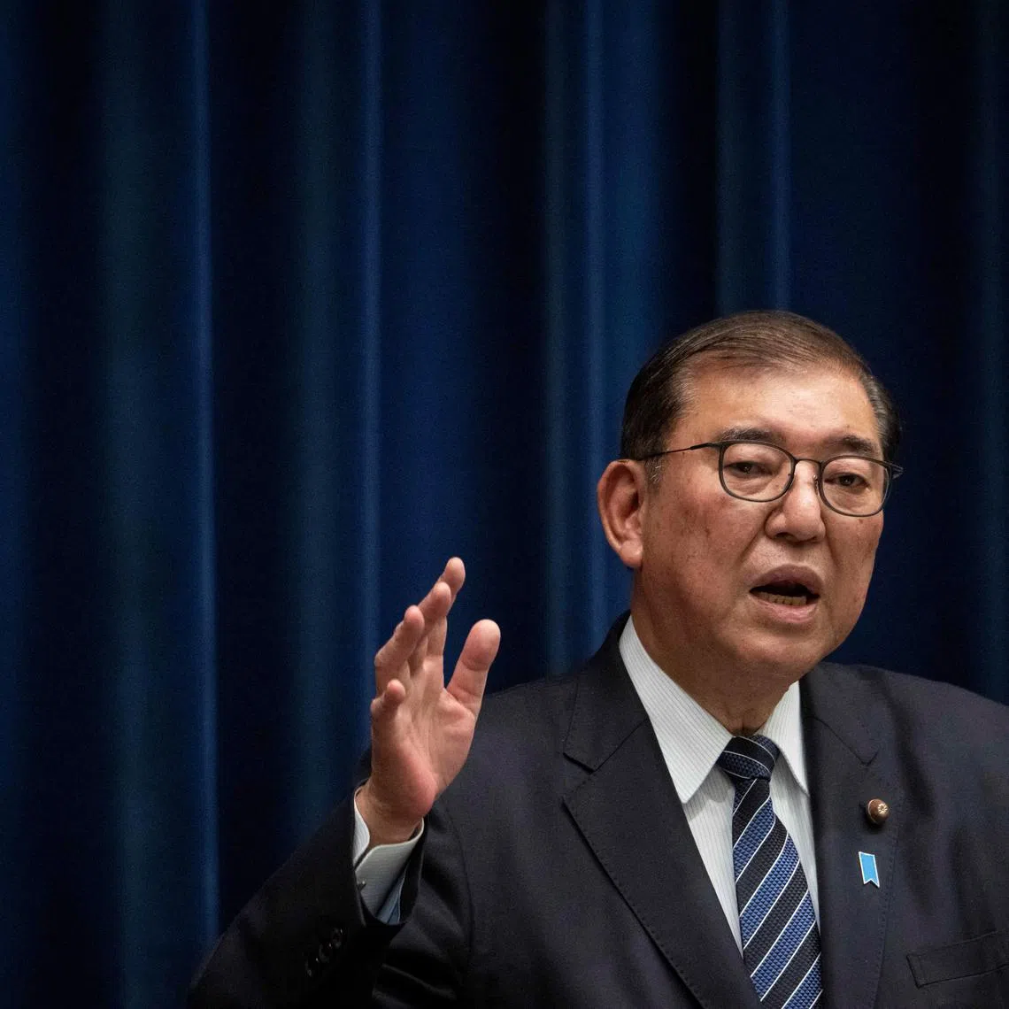FILE PHOTO: Japan's Prime Minister Shigeru Ishiba speaks during a press conference at the prime minister's office in Tokyo, Japan, on December 24, 2024.     YUICHI YAMAZAKI/Pool via REUTERS/File Photo