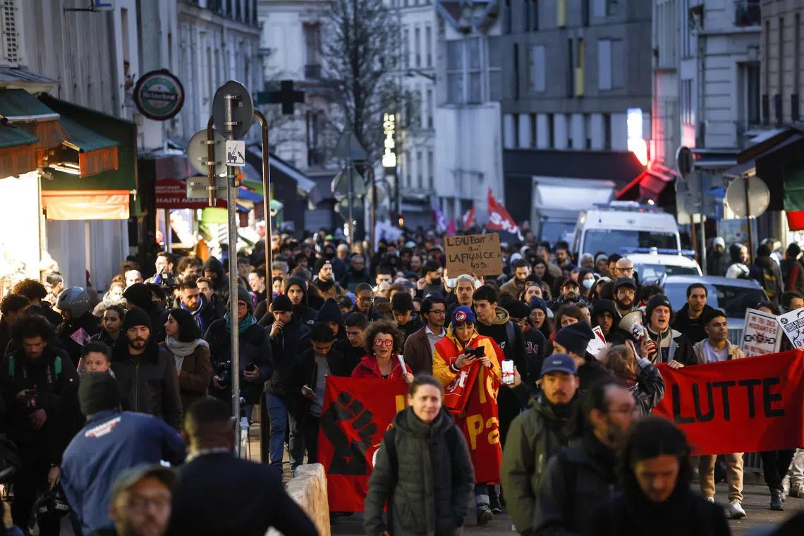 Protesters gather in a demonstration against the government pension reform in Paris, on March 22, 2023.