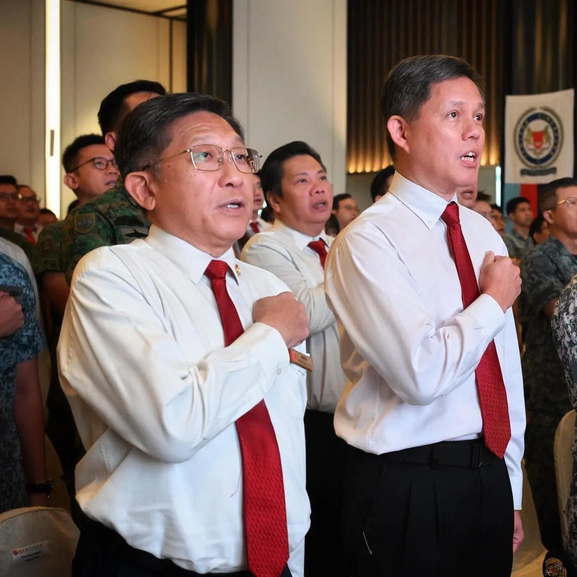From left: SCCI President Kho Choon Keng, Defence Minister Chan Chun Sing, Chief of Defence Force Vice Admiral Aaron Beng, Ng Siew Quan, Vice-President of SCCCI and BG (NS) Kenneth Liow, Director, National Service Affairs. National Service Directorate, Ministry of Defence reciting the pledge at the SAF Day Combined Rededication Ceremony on July 1, 2026.