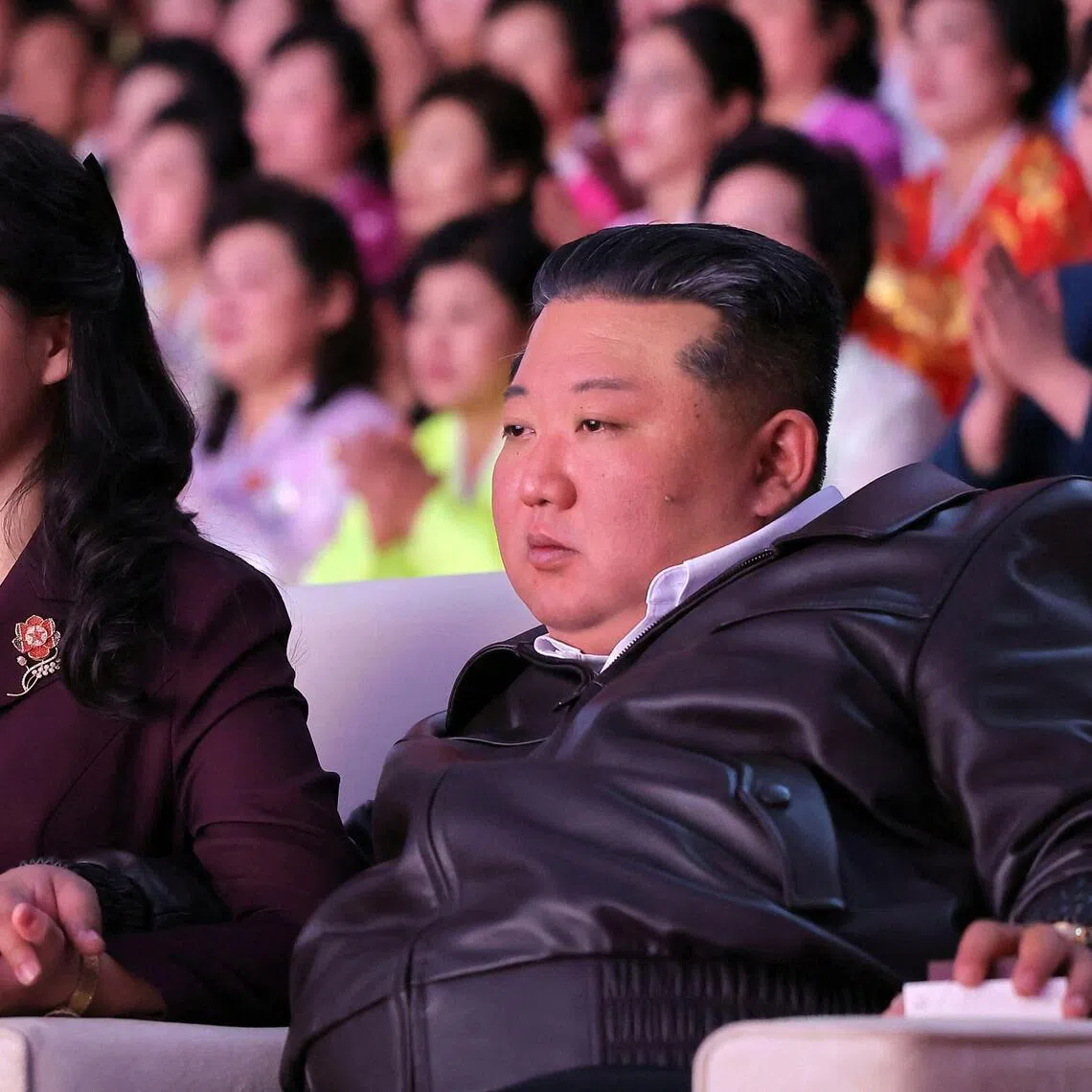 North Korean leader Kim Jong Un and his daughter Kim Ju Ae watching a performance commemorating International Women's Day at the Pyongyang Gymnasium, on March 8.
