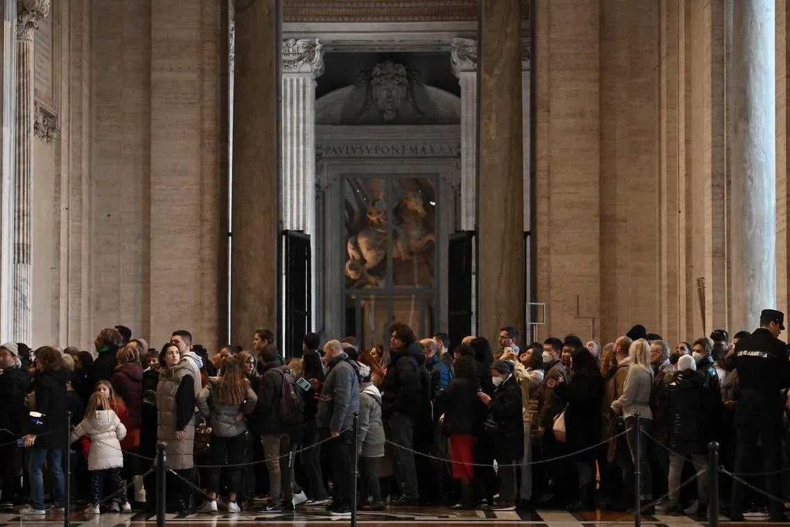 Vatican police said that 65,000 people had filed past on the first day.