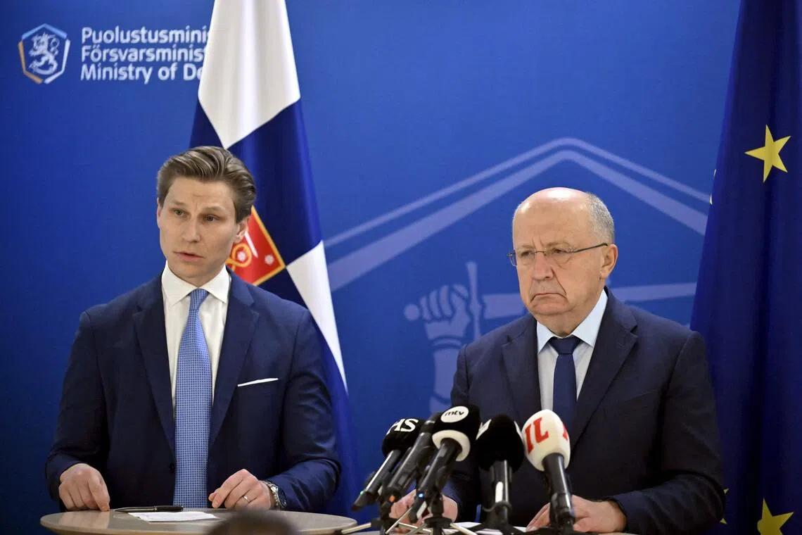 EU Defence Commissioner Andrius Kubilius (right) taking part in a Sept 26 press briefing with Finnish Defence Minister Antti Haekkaenen.