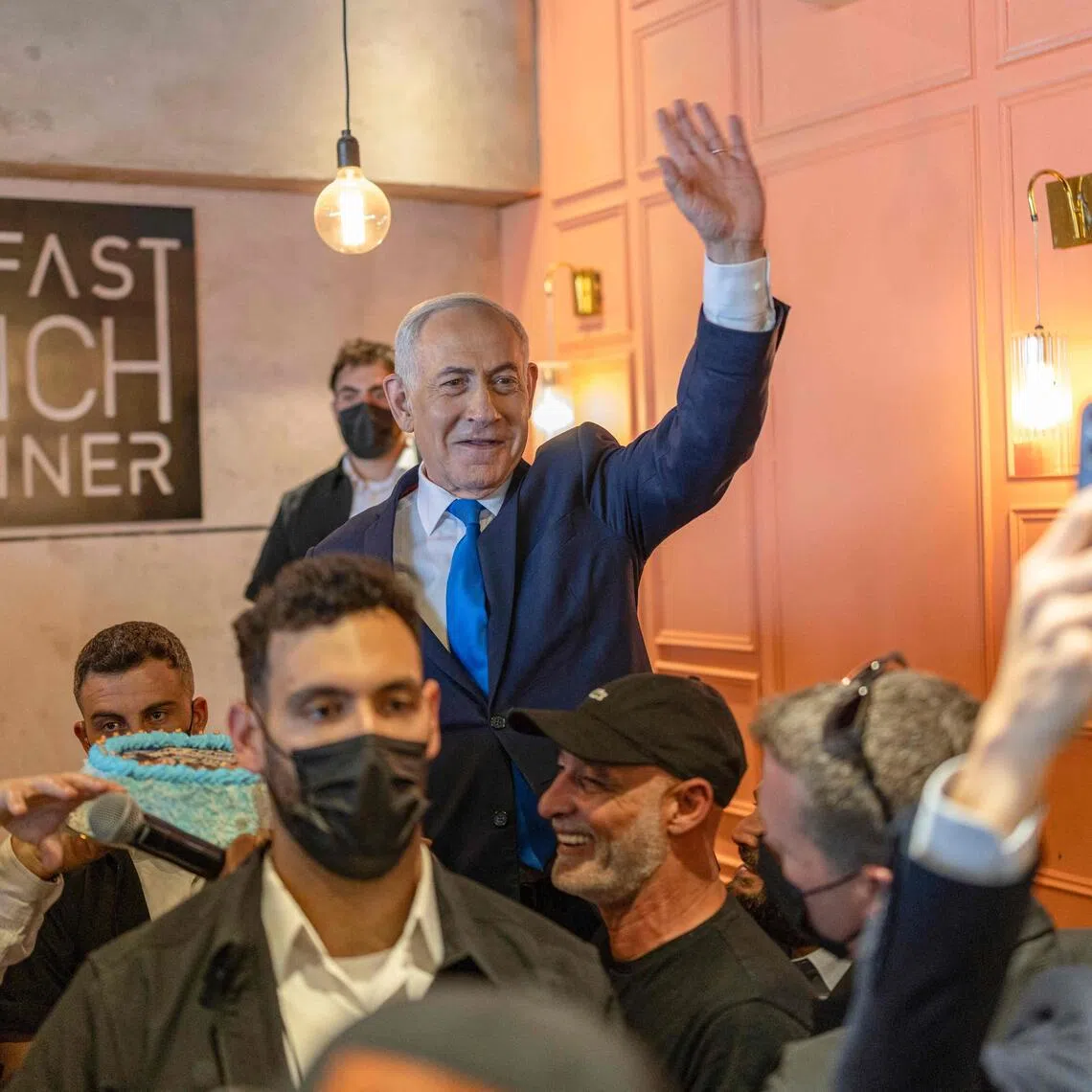 Israeli PM Benjamin Netanyahu (centre) is in the midst of a close race for re-election, with polls showing him more or less in a dead heat with former army chief Gadi Eisenkot.