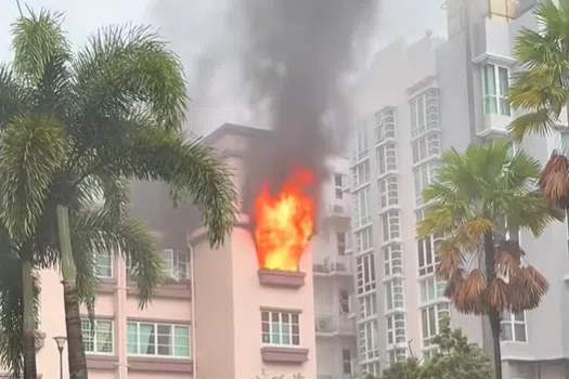 Footage circulating on social media shows flames flaring out of a residential unit’s window.