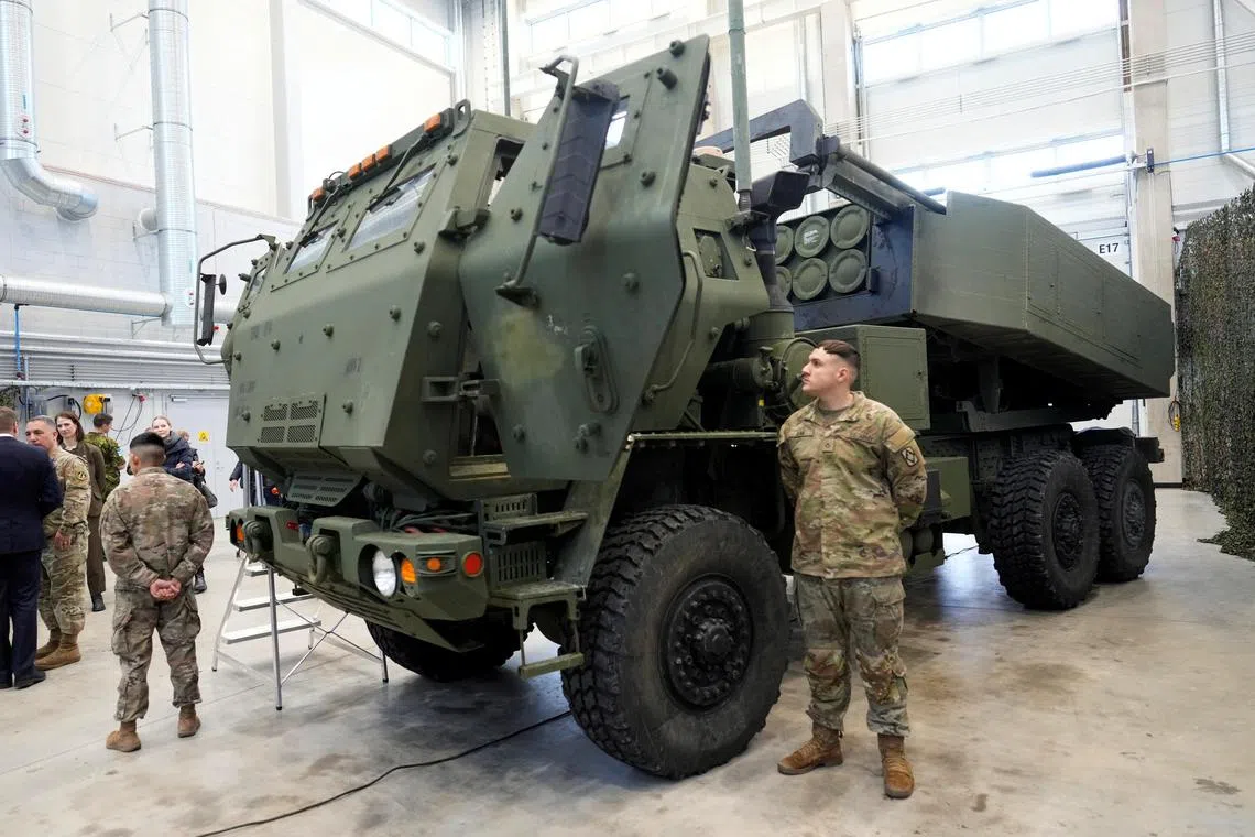 U.S. Servicemen stand next to the M142 High Mobility Artillery Rocket System (HIMARS) during its presentation in Tapa military base, Estonia January 6, 2023. REUTERS/Ints Kalnins