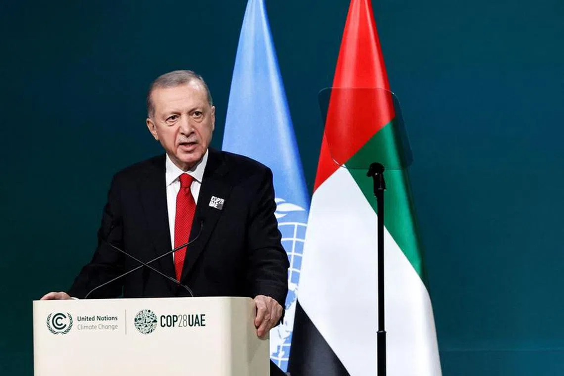 Turkish President Tayyip Erdogan delivers a national statement at the World Climate Action Summit during the United Nations Climate Change Conference (COP28) in Dubai, United Arab Emirates, December 1, 2023. REUTERS/Thaier Al Sudani