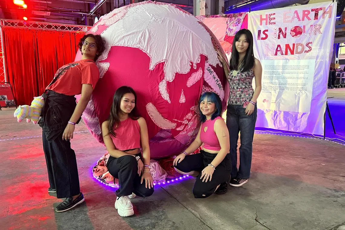 dlsustainable - Ms Lumin Hew (second from the left) founded Fashion Parade in 2021 to find more like-minded youths passionate about sustainable fashion.

Credit: Fashion Parade
