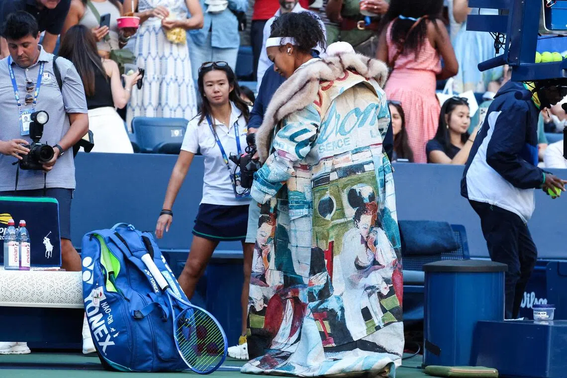TOPSHOT - Japan's Naomi Osaka arrives to play Kazakhstan's Elena Rybakina in their women's singles round of 16 tennis match on day nine of the US Open tennis tournament at the USTA Billie Jean King National Tennis Center in New York on September 7, 2026. (Photo by Leonardo MUNOZ / AFP)