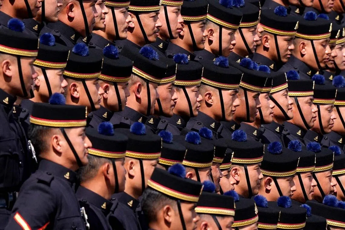 The King's Gurkha Artillery regiment preparing for a group photo during a visit by Britain's King Charles, in Larkhill, Britain, June 4.