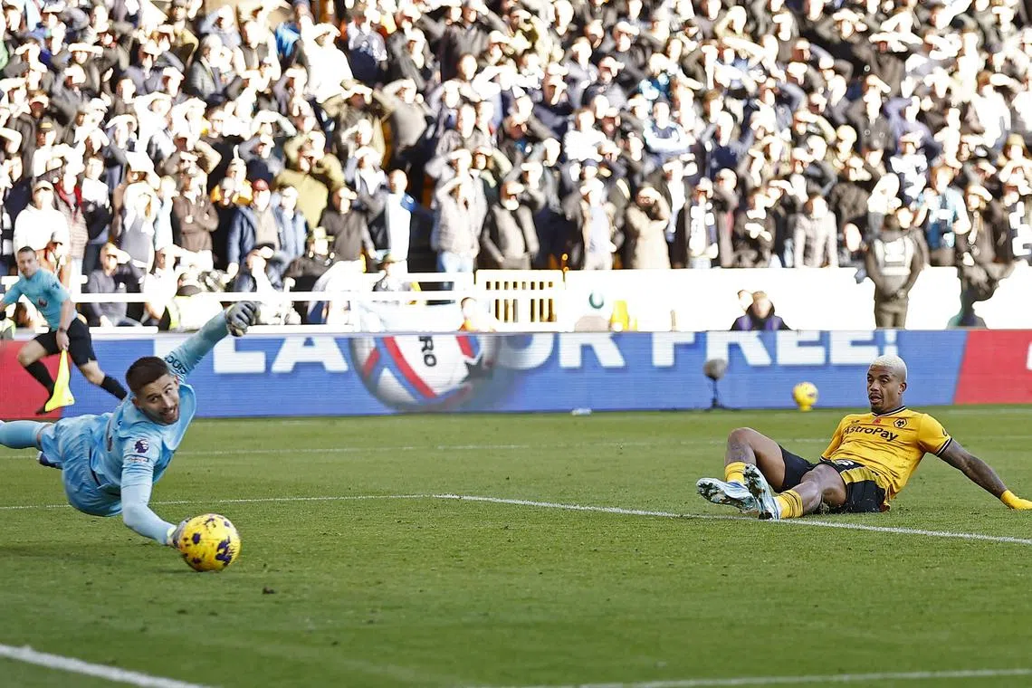 Wolverhampton Wanderers' Mario Lemina scores their second goal past Tottenham Hotspur's Guglielmo Vicario in the 2-1 Premier League win.