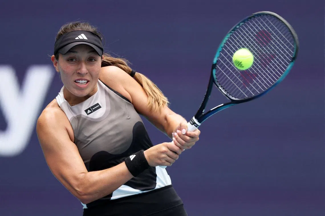 MIAMI GARDENS, FLORIDA - MARCH 23: Jessica Pegula of the United States plays a backhand against Katherine Sebov of Canada in their first round match at Hard Rock Stadium on March 23, 2023 in Miami Gardens, Florida.   Clive Brunskill/Getty Images/AFP (Photo by CLIVE BRUNSKILL / GETTY IMAGES NORTH AMERICA / Getty Images via AFP)