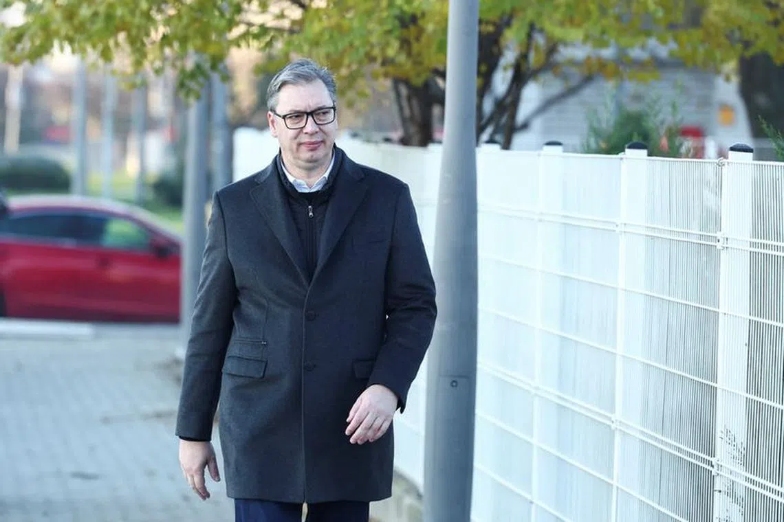 FILE PHOTO: Serbian President Aleksandar Vucic arrives at a polling station to cast his vote during the parliamentary election in Belgrade, Serbia, December 17, 2023. REUTERS/Marko Djurica/File Photo