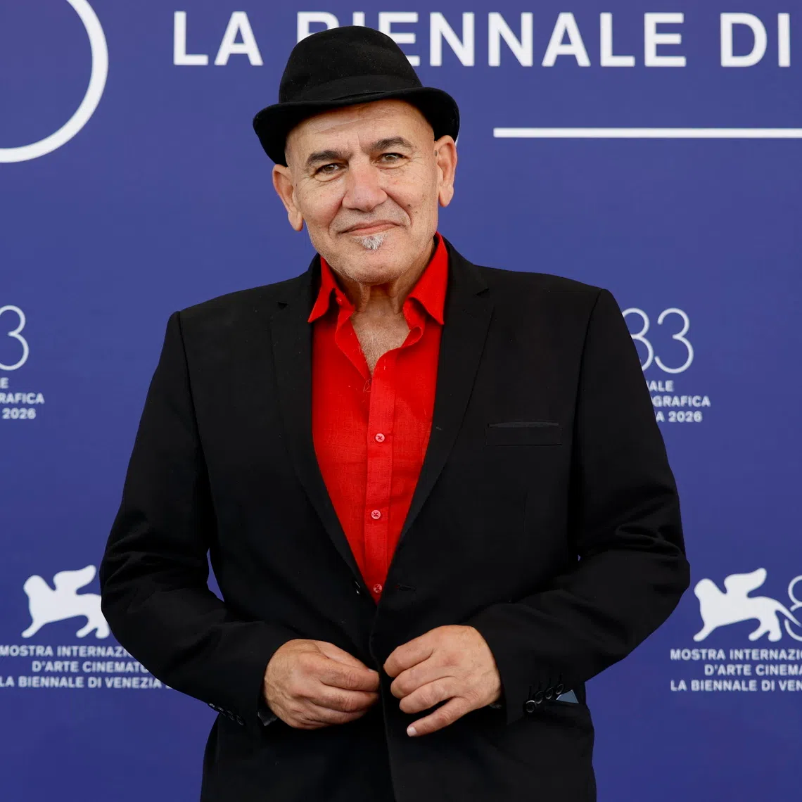 Palestinian producer Rashid Masharawi poses for the photocall of Al Mowaten Osama (Citizen Osama) at the 83rd annual Venice International Film Festival, in Venice, Italy.