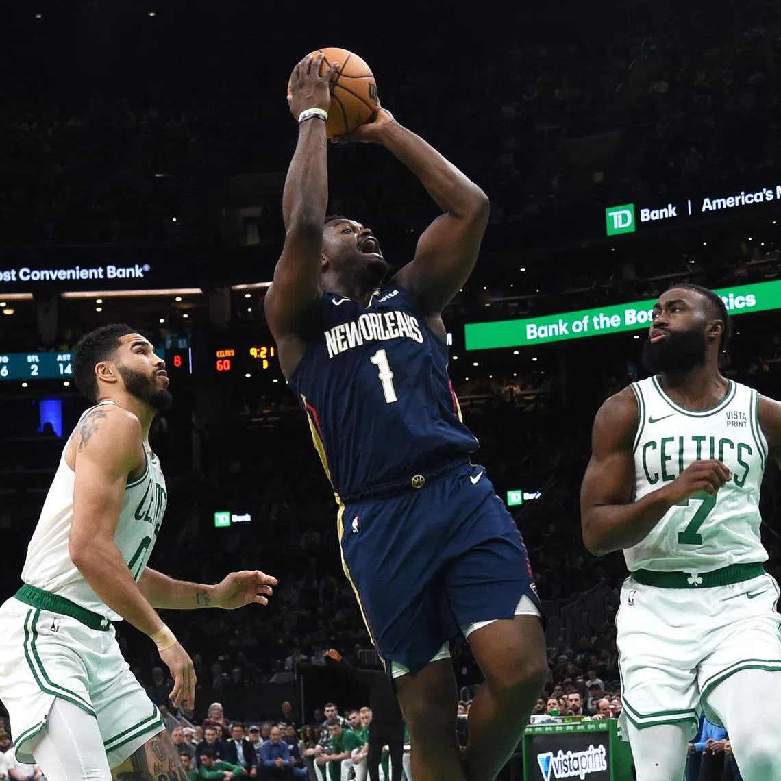 New Orleans Pelicans forward Zion Williamson (centre) shoots the ball during the second half against Boston Celtics on Jan 29.