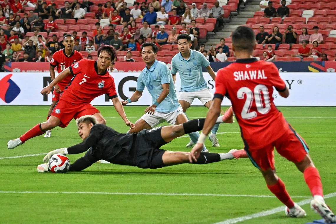 Two calamitous errors by Cambodia goalkeeper Vireak Dara (in black) ensured Singapore opened their Asean Championship Group A campaign with a 2-1 win at the National Stadium, on Dec 11, 2024.