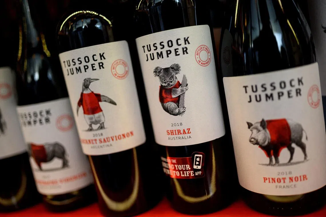 A bottle of Australian wine (2nd R) is displayed amongst other wines at a shop in Beijing on December 23, 2020. 