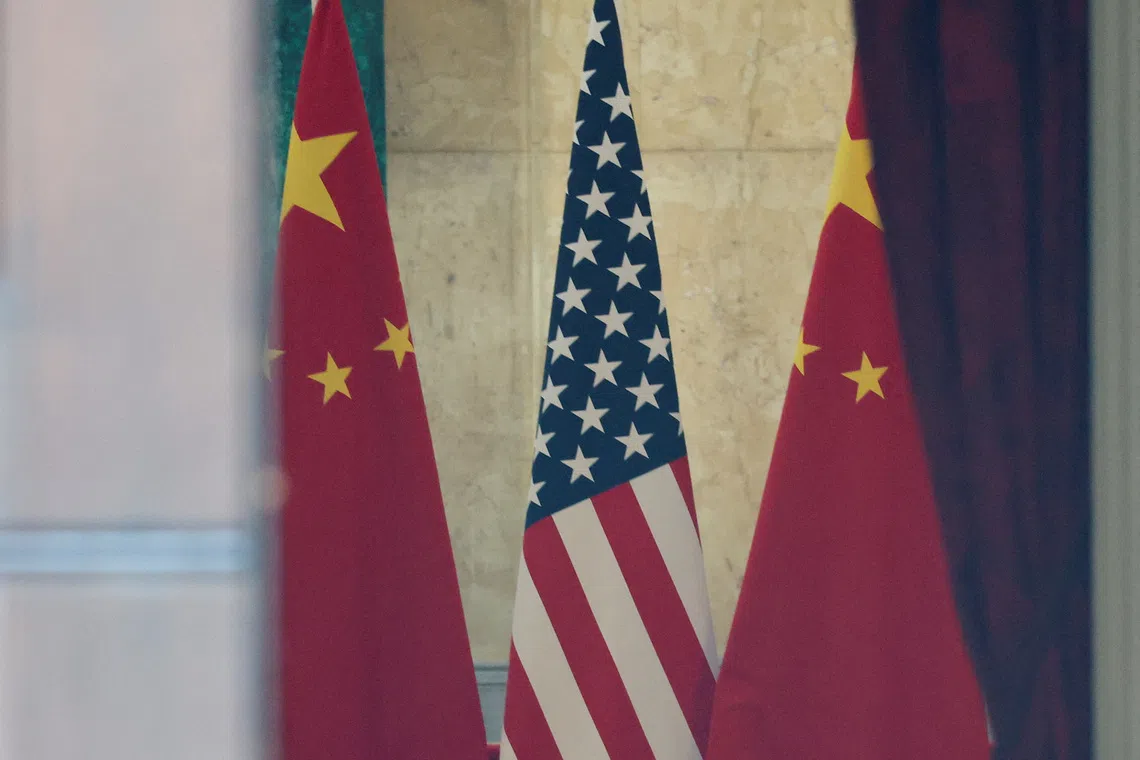 FILE PHOTO: U.S. and China flags are pictured at Lancaster House, in London, Britain, June 10, 2025. REUTERS/Toby Melville/File photo