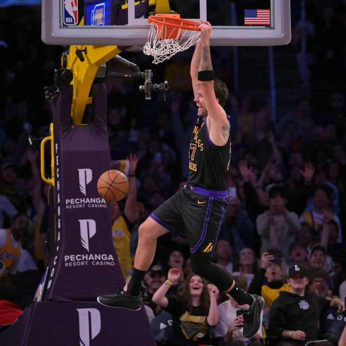 Los Angeles Lakers guard Luka Doncic going up for a dunk in the final minutes of the 127-113 NBA win over the Cleveland Cavaliers at Crypto.com Arena on March 31, 2026.