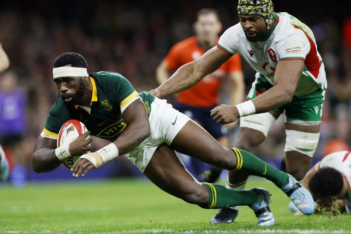 FILE PHOTO: Rugby Union - Autumn Internationals - Wales v South Africa - Principality Stadium, Cardiff, Wales, Britain - November 23, 2024 South Africa's Siya Kolisi scores their fourth try Action Images via Reuters/Peter Cziborra/File Photo