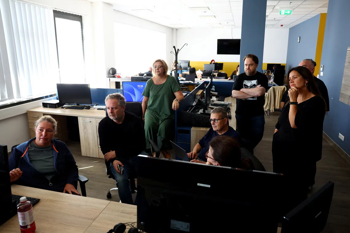 Editors and journalists prepare the relaunch of the Hungarian newspaper Nepszabadsag in the newsroom in Budapest, Hungary, October 6, 2026. REUTERS/Bernadett Szabo