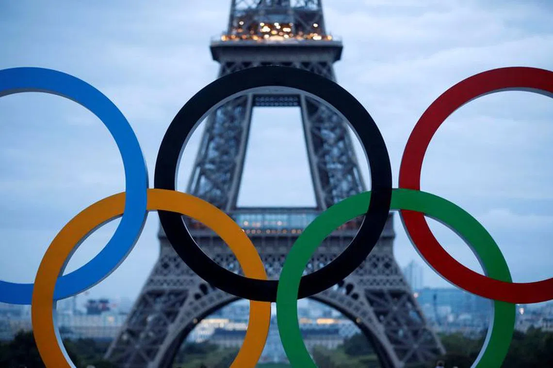 FILE PHOTO: Olympic rings to celebrate the IOC official announcement that Paris won the 2024 Olympic bid are seen in front of the Eiffel Tower at the Trocadero square in Paris, France, September 14, 2017.   REUTERS/Christian Hartmann/File Photo