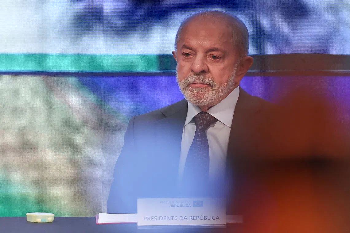 FILE PHOTO: Brazilian President Luiz Inacio Lula da Silva, a candidate for reelection for the Workers' Party (PT), sits on the day he announces a national ban on the operation of online betting companies, known locally as \"bets\" and other economic measures aimed at protecting families and working-class households, in Sao Paulo, Brazil, September 25, 2026. REUTERS/Amanda Perobelli/File Photo