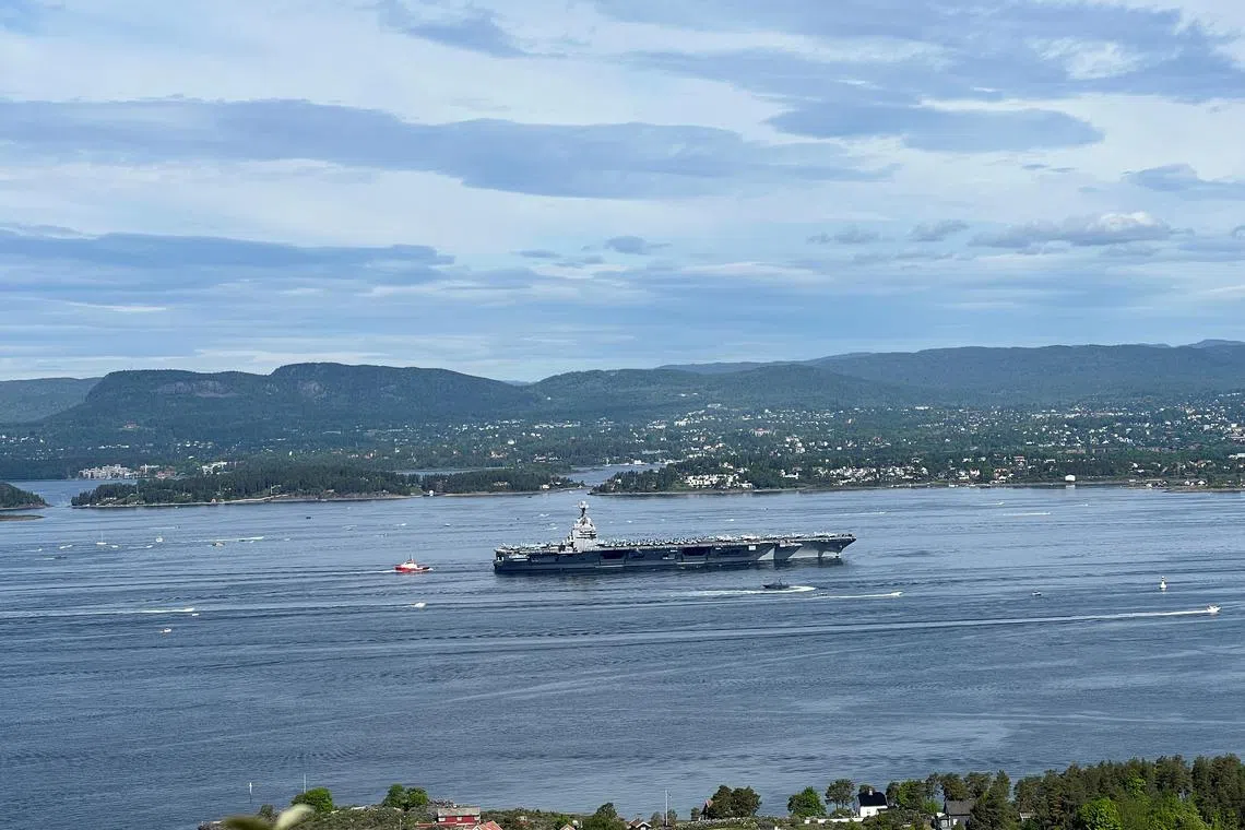 FILE PHOTO: U.S. aircraft carrier USS Gerald R. Ford sails on the Oslo fjord towards Oslo, Norway May 24, 2023. REUTERS/Victoria Klesty/File Photo