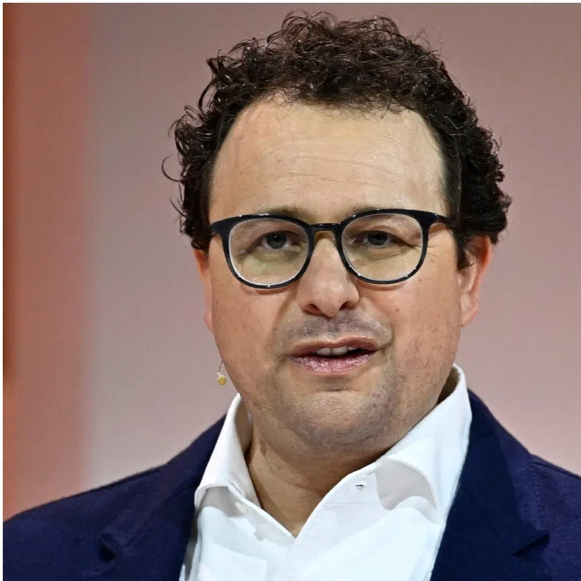 Top AI executives like Anthropic CEO Dario Amodei (left) and OpenAI chief Sam Altman (right) say they want to slow the breakneck pace of artificial intelligence development.