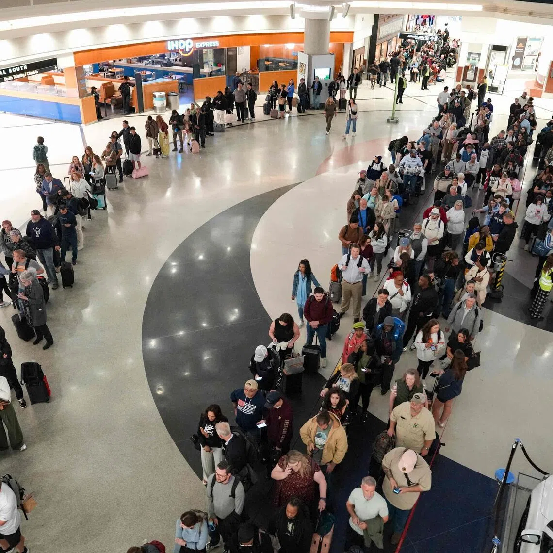 Employees of the Transportation Security Administration have not been paid for weeks, snarling air travel at key hubs.