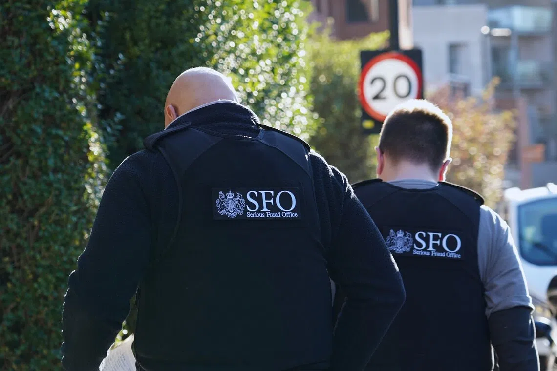 SFO investigators and police officers arrested two men after launching raids in London and West Yorkshire, northern England, on Nov 20.