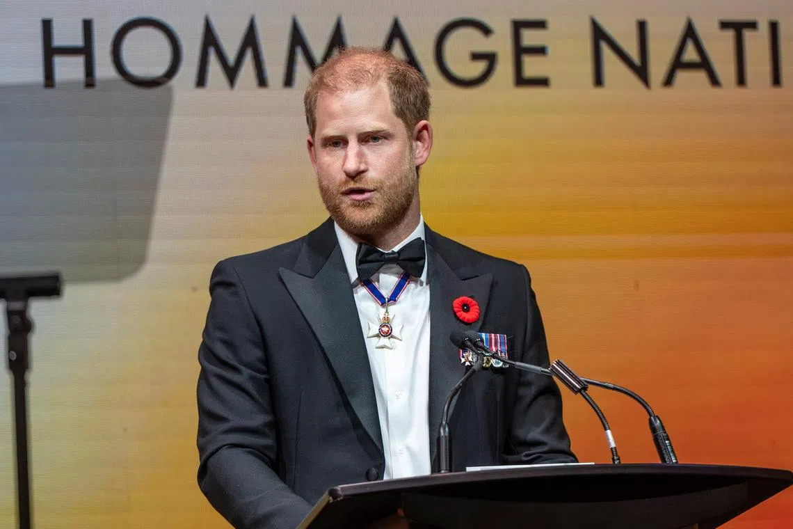 Prince Harry delivers remarks at the True Patriot Love's National Tribute Dinner in Toronto on Thursday, Nov. 6, 2025. The annual event, organized by the True Patriot Love Foundation, honours Canada's military community and raises funds to support active service members, veterans and their families.    Eduardo Lima/Pool via REUTERS