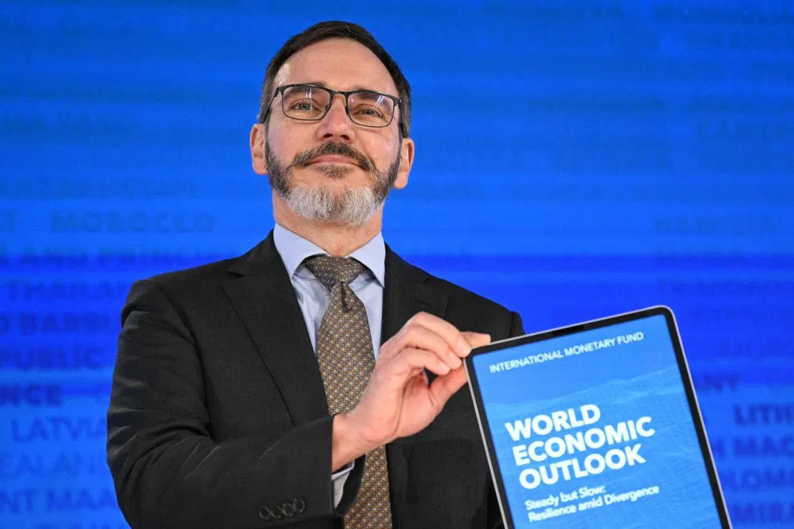 The IMF’s chief economist Pierre-Olivier Gourinchas presents the World Economic Outlook to reporters in Washington.