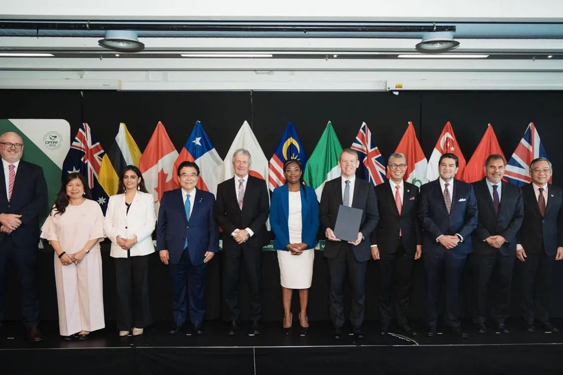 Minister for Trade and Industry Gan Kim Yong (right), who represented Singapore at the meeting, welcomed Britain’s entry.