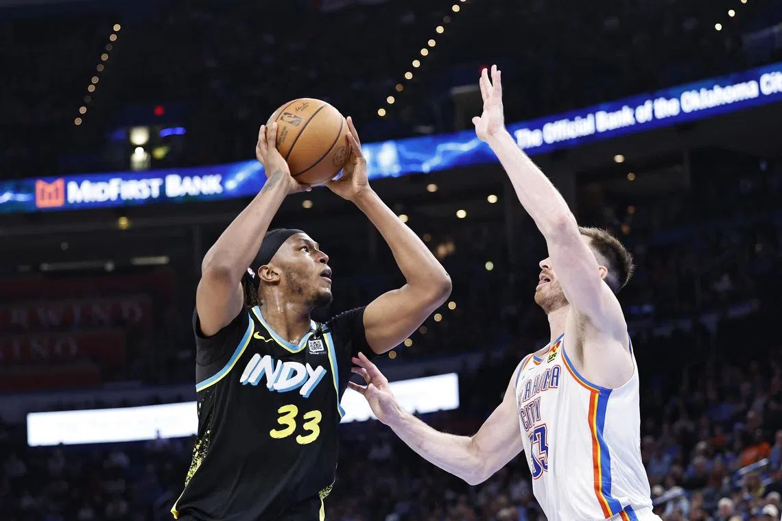 Indiana Pacers centre Myles Turner shoots as Oklahoma City Thunder forward Gordon Hayward defends during the second half at Paycom Centre.