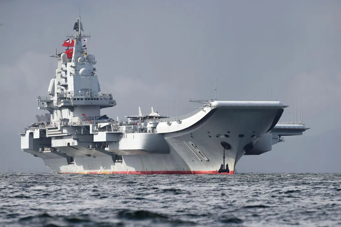 Japan's defence ministry said Chinese carrier Liaoning conducted more than 300 take-offs and landings of fixed-wing aircraft and helicopters.
