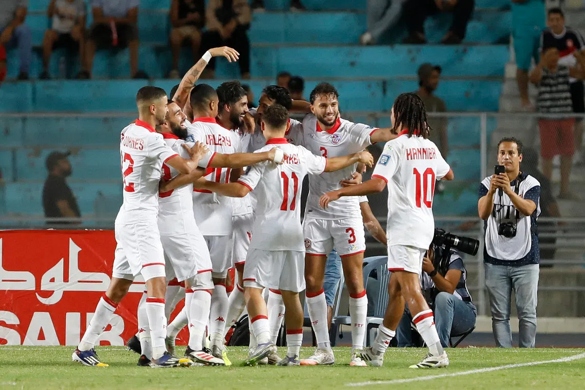 Soccer Football - World Cup - CAF Qualifiers - Group H - Tunisia v Liberia - Stade Hammadi Agrebi, Rades, Tunisia - September 4, 2025 Tunisia's Ferjani Sassi celebrates scoring their second goal with teammates REUTERS/Zoubeir Souissi