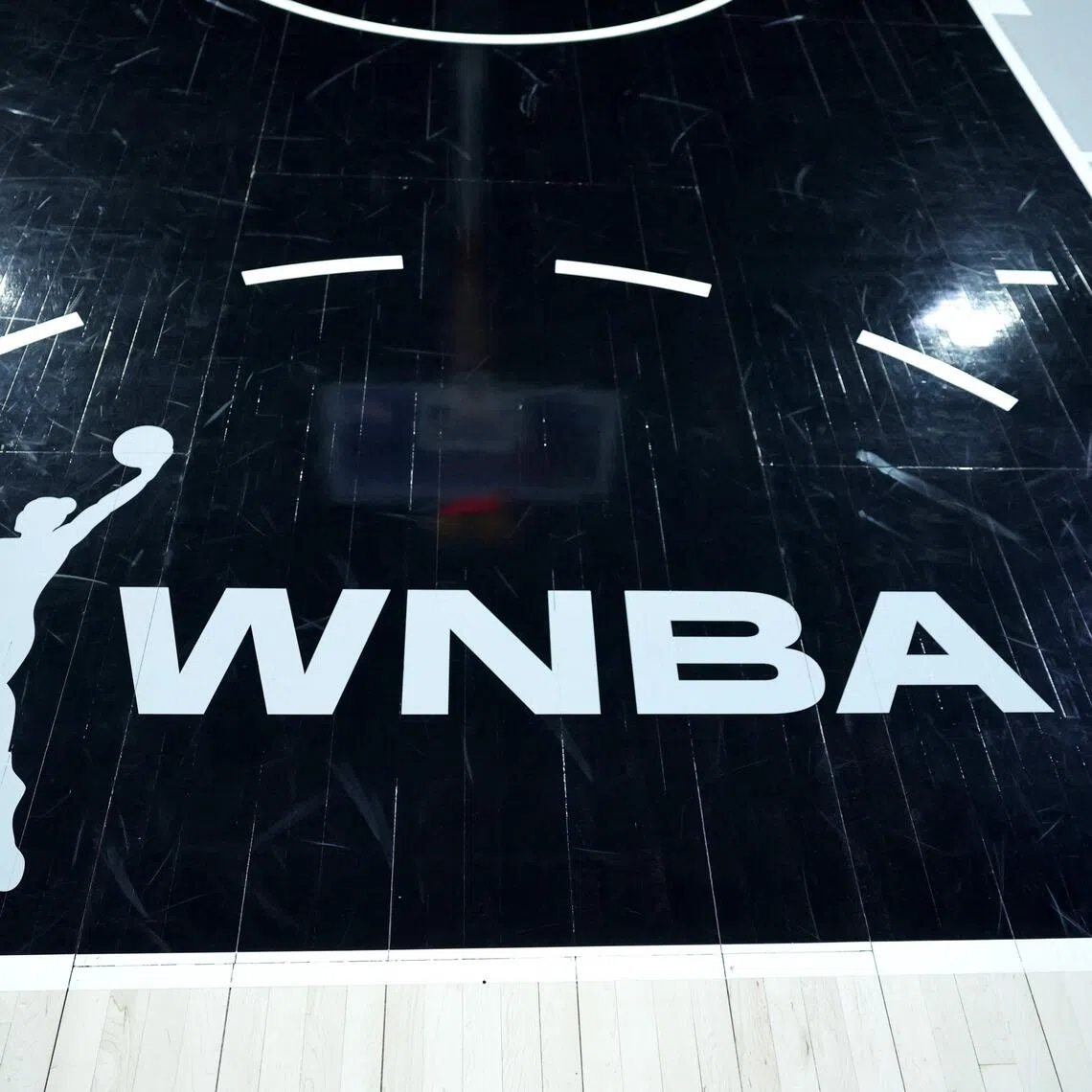 A WNBA logo is shown on the court before a game between the Connecticut Sun and the Las Vegas Aces at Michelob ULTRA Arena on June 25, 2025 in Las Vegas, Nevada. 