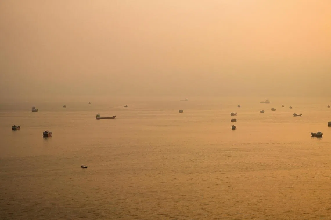 Vessels in the Strait of Hormuz, as seen from Musandam, Oman, on Oct 12.