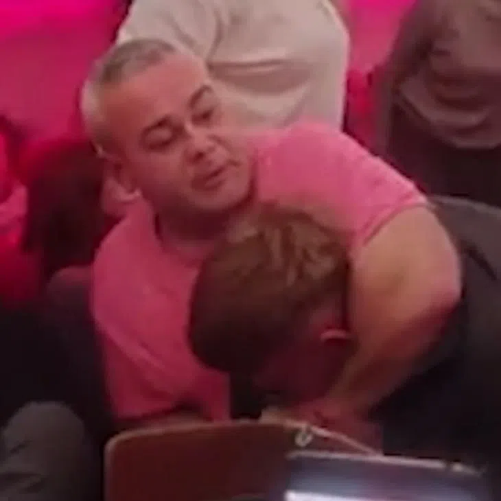 Police boarded the plane in Brussels and removed two passengers, who are now banned from the airline for life.