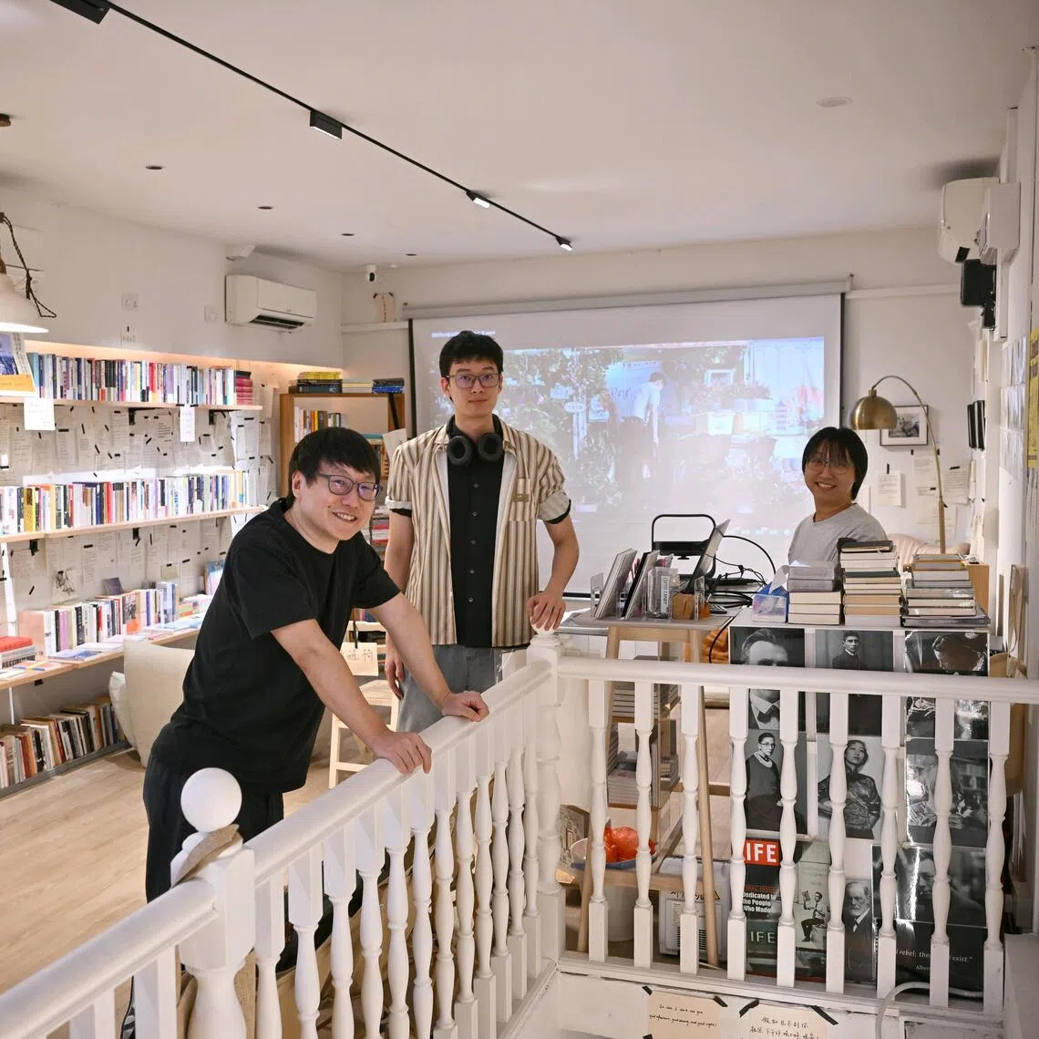 (From left) Owner of TBC Bookstore, Odie Wu, 42, Volunter at TBC Bookstore, Haller Shen, 24,  and Store manager of TBC Bookstore, Xiaofei Yue, 36, on Dec 23.