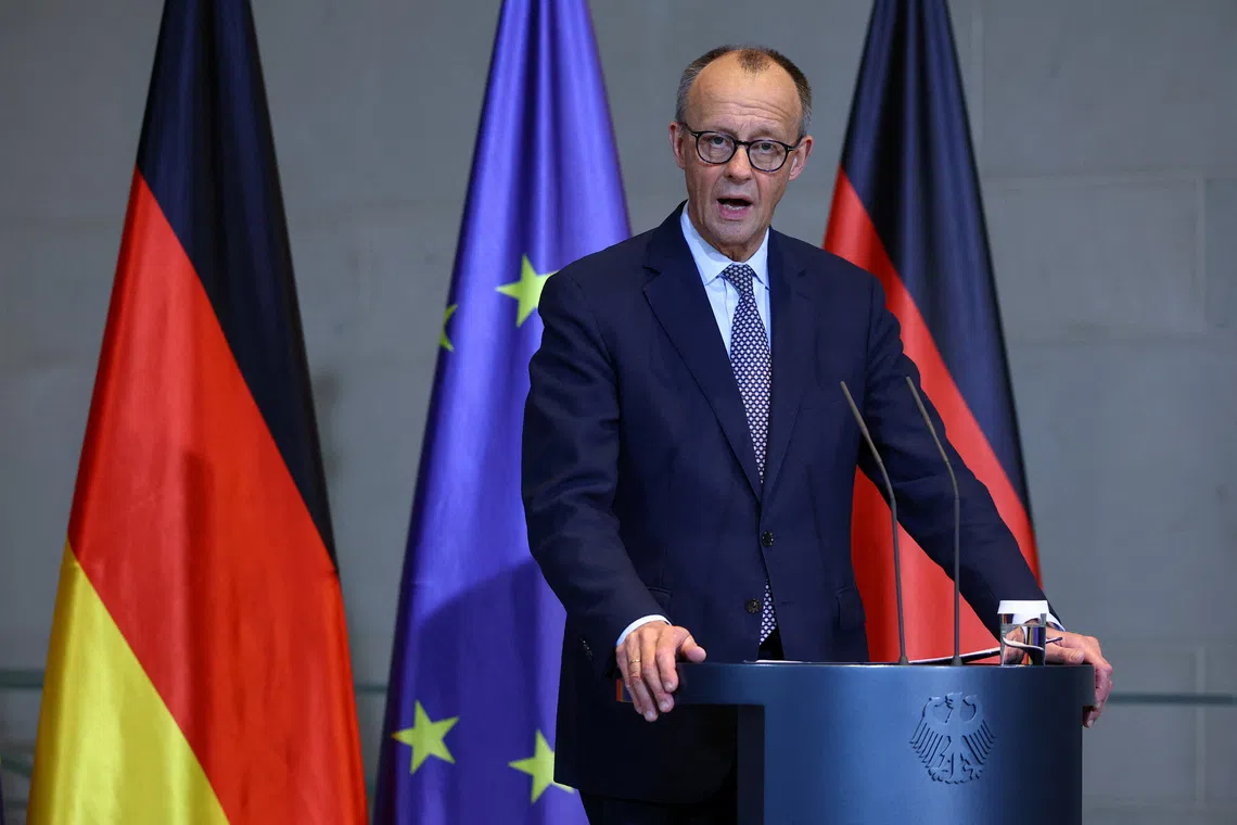 German Chancellor Friedrich Merz at the Chancellory in Berlin on Dec 5. He is expected to visit the Yad Vashem Holocaust memorial in Israel.