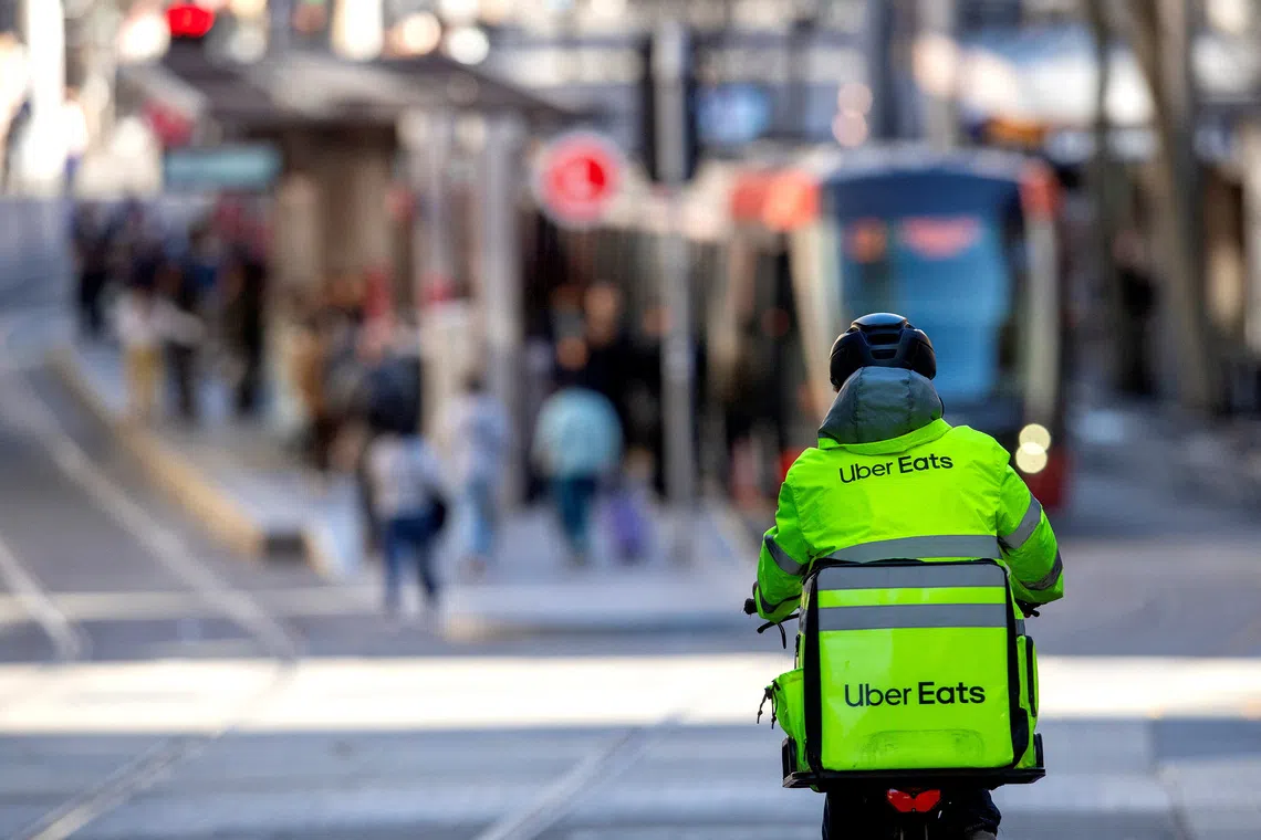 Australia sets ‘world-leading’ minimum pay and insurance rules for gig delivery workers
