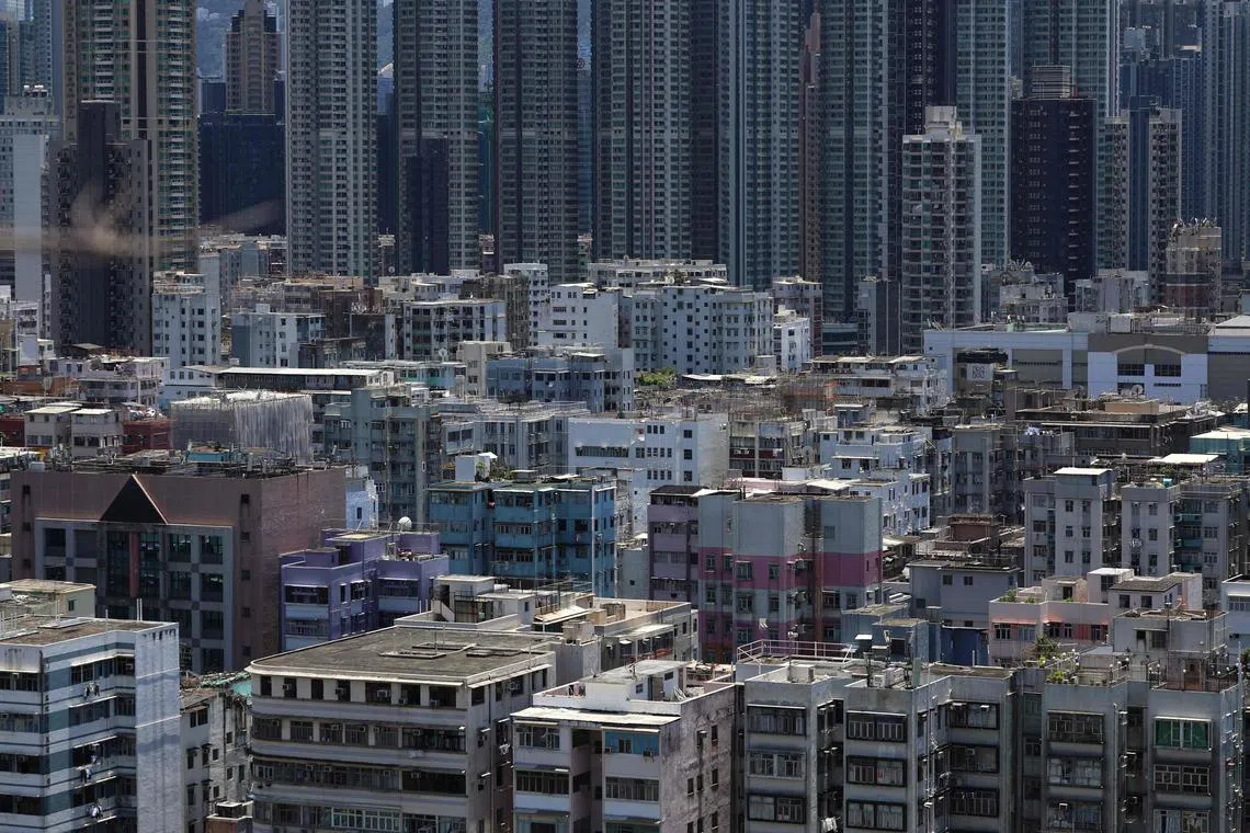 A general view shows residential buildings in Hong Kong on July 8, 2023. (Photo by May JAMES / May James / AFP)