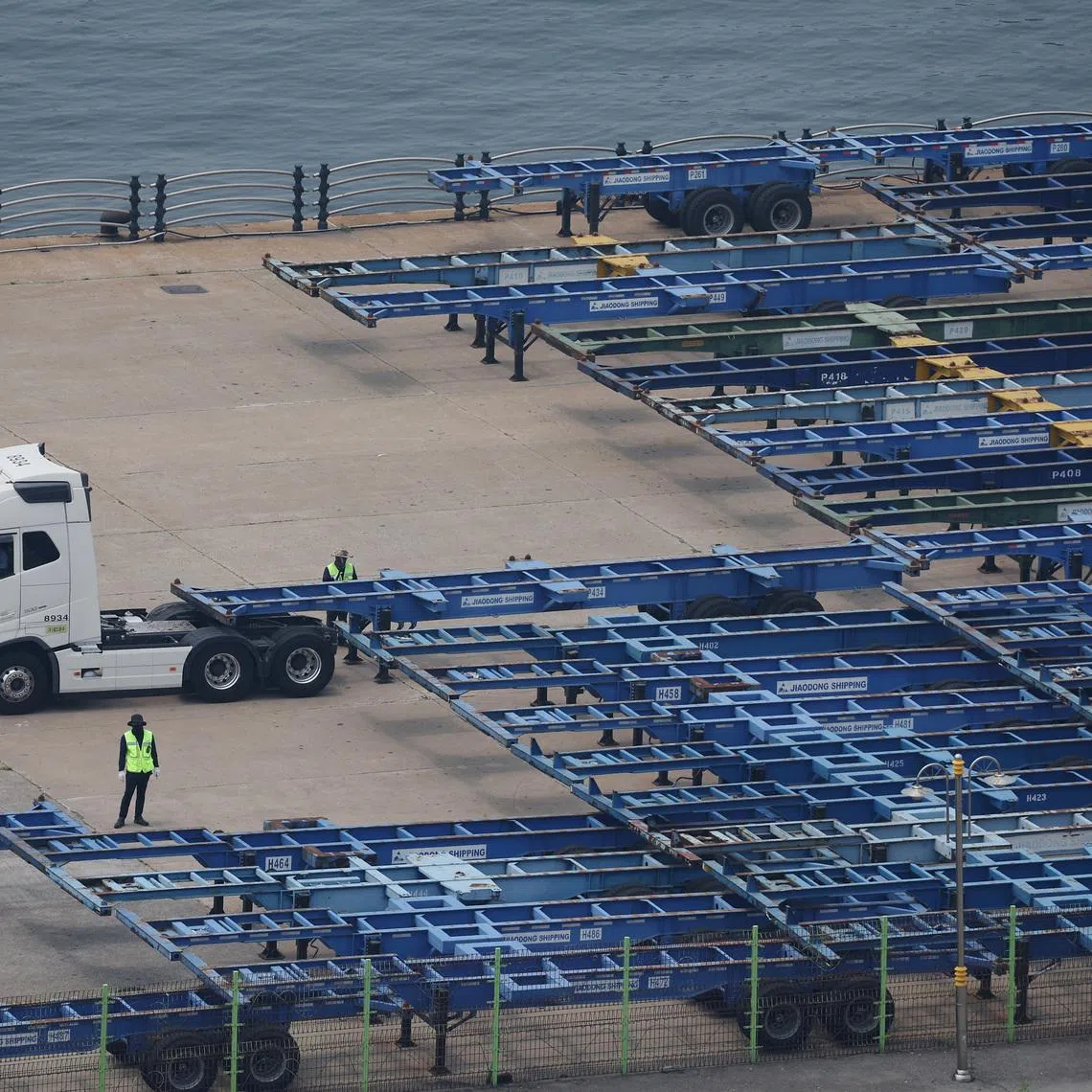 Employees work at Pyeongtaek port in Pyeongtaek, South Korea, July 8, 2025. REUTERS/Kim Hong-Ji