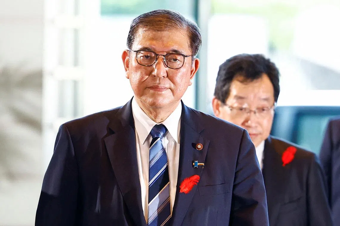 Japan Prime Minister Shigeru Ishiba arrives at his official residence in Tokyo on Oct 1.